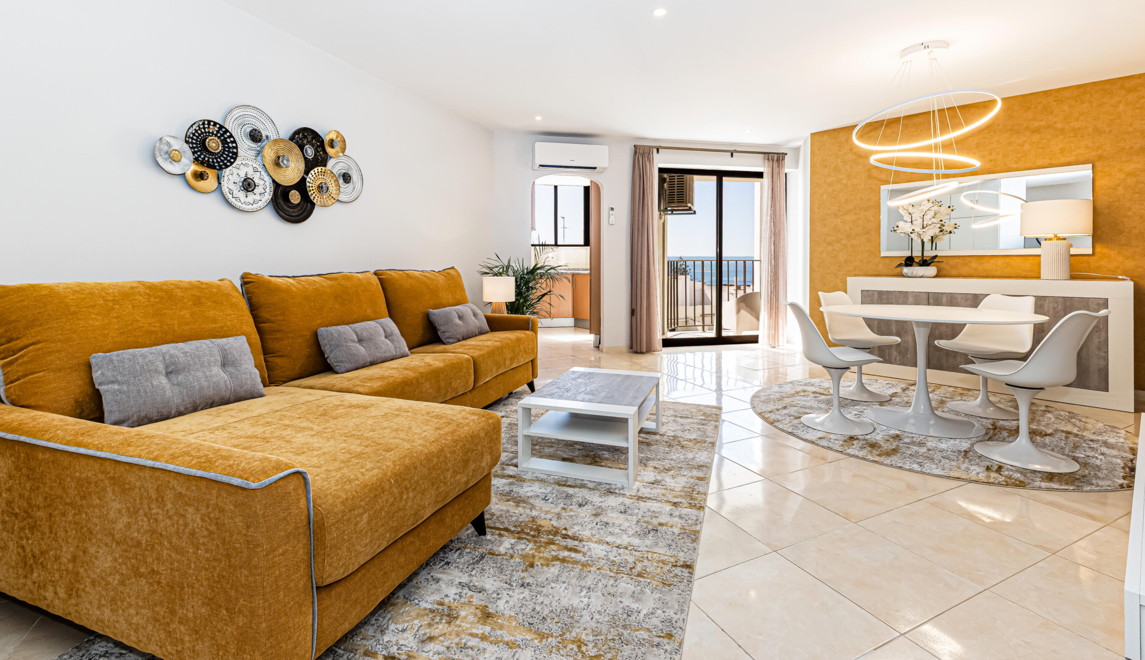 Modern living room with dining area and sea view Ideal for relaxed stays in the Algarve